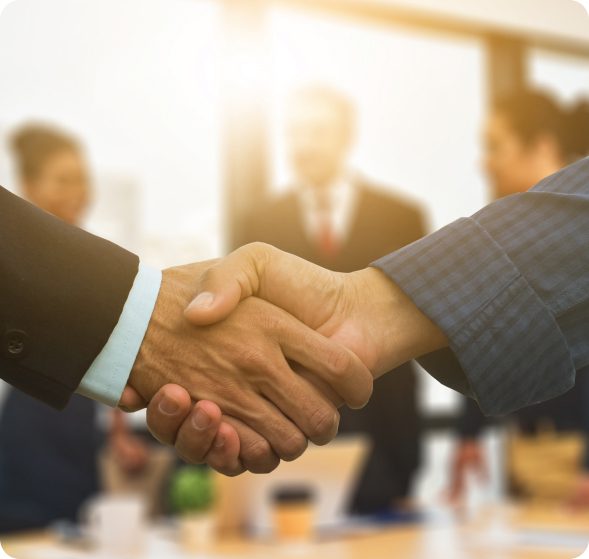 Business partnership handshake